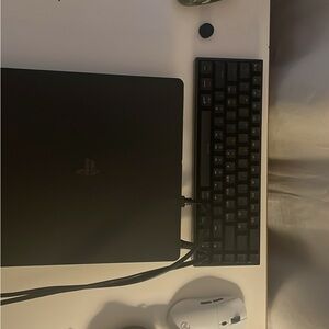 Sony Black Gaming Console controller, keyboard, headset, and mouse